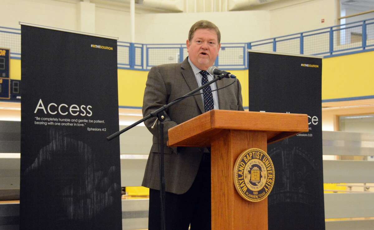 Wayland Baptist University President Dr. Bobby Hall address a gathering of faculty and staff during professional development on Wednesday. Hall encouraged university employee to strive to #BeTheSolution through Faith, Access, and Excellence.