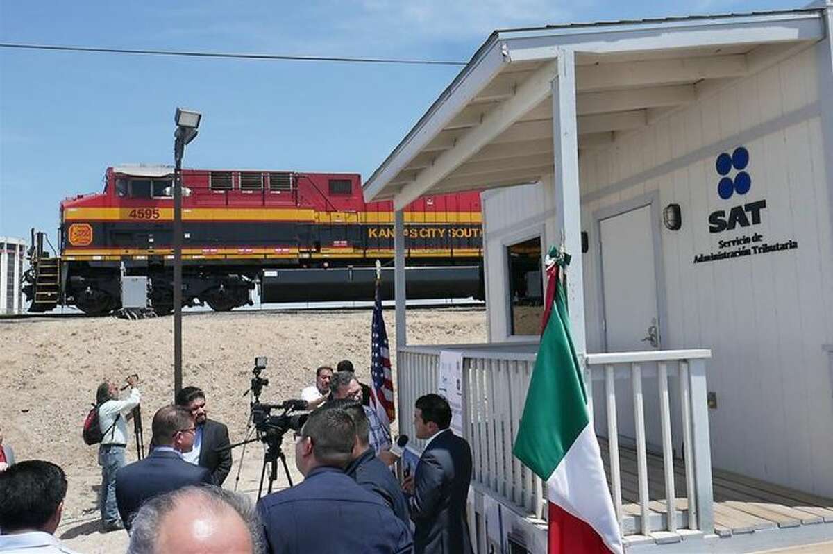 A Kansas City Southern engine pulls a northbound train after U.S. Customs and Border Protection (CBP), Servicio de Administración Tributaria (SAT)/Aduana Mexico and Kansas City Southern together with U.S. Rep. Henry Cuellar and Mayor Pete Saenz, participated in a ribbon-cutting ceremony for the unified rail cargo processing facility, Thursday. The facility will allow CBP officers and Mexican Customs officers to work collaboratively in the rail inspection environment. 