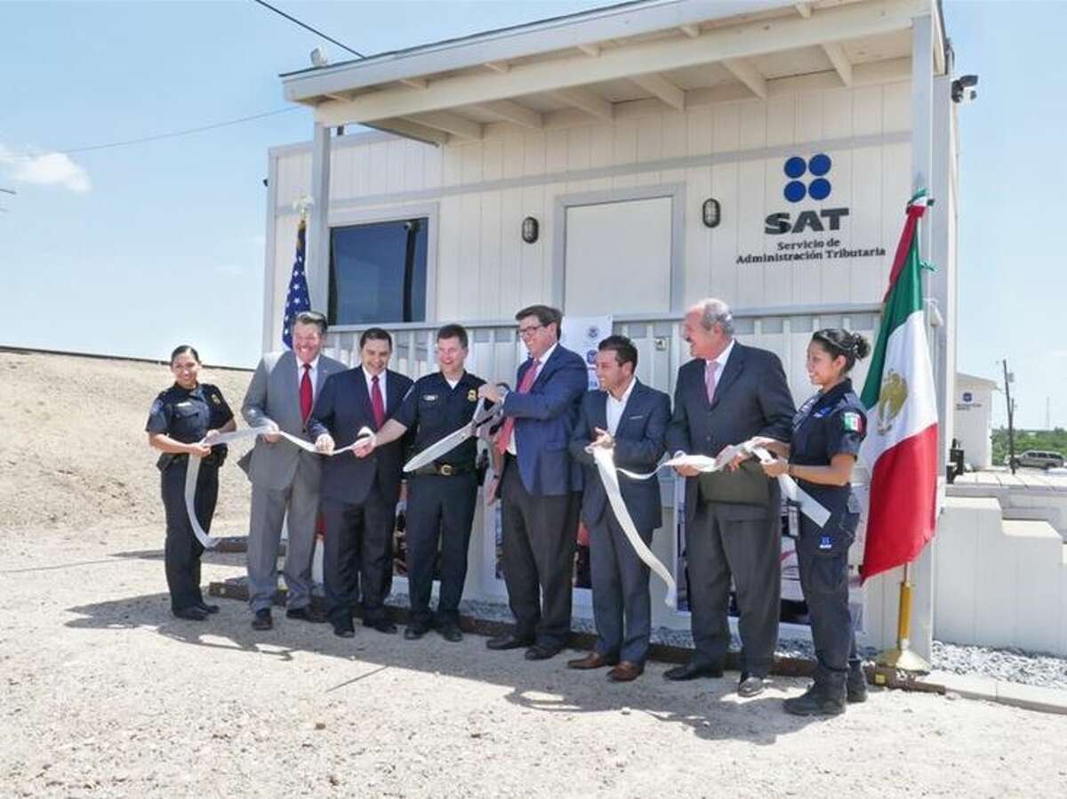 U.S. Customs and Border Protection (CBP), Servicio de Administración Tributaria (SAT)/Aduana Mexico and Kansas City Southern together with U.S. Rep. Henry Cuellar and Mayor Pete Saenz, participated in a ribbon-cutting ceremony for the unified rail cargo processing facility, Thursday. The facility will allow CBP officers and Mexican Customs officers to work collaboratively in the rail inspection environment. 