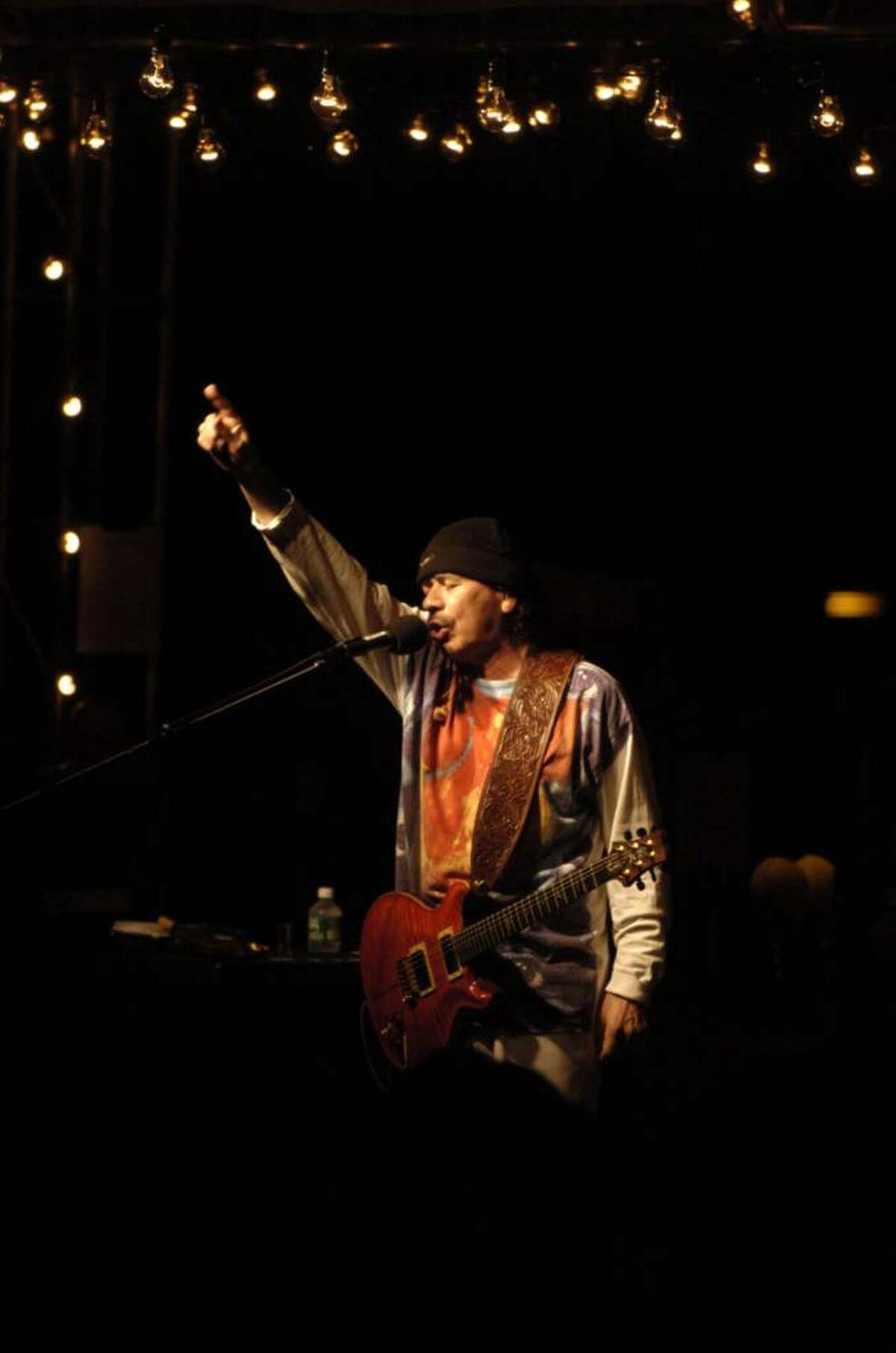 Carlos Santana performs during the annual China Care benefit for Chinese orphans at Belle Haven Club in Greenwich in 2005.