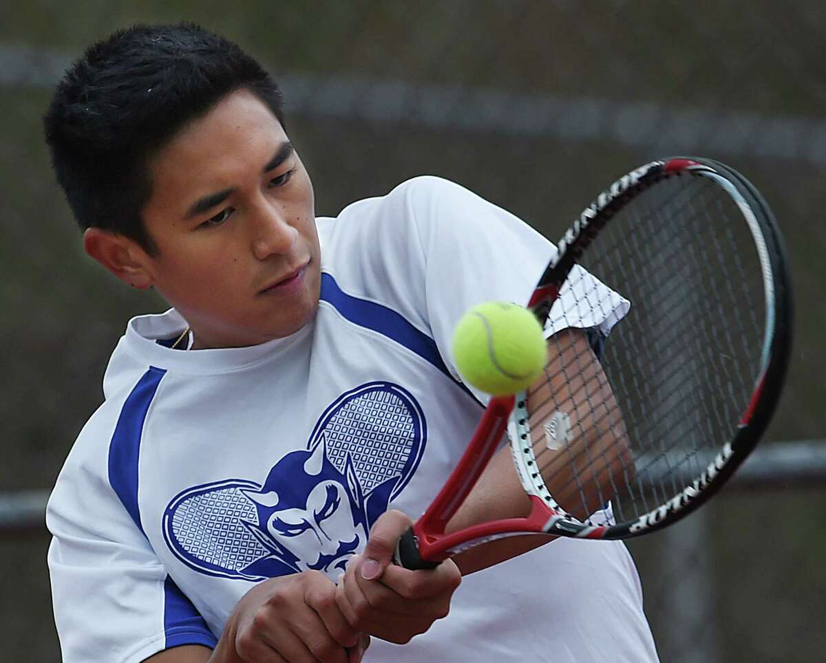 John Delgado, a senior, at practice, Friday, April 29, 2016, at the courts at Painter Park in West Haven is the top seeded single player at West Haven High School. (Catherine Avalone/New Haven Register)