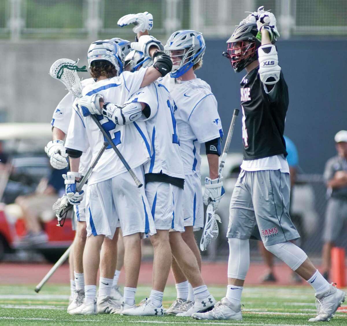 Darien High School players celebrate a goal in the Class L boys lacrosse championship against Cheshire High School, played at Brien McMahon High School in Norwalk. Saturday, June 10, 2017