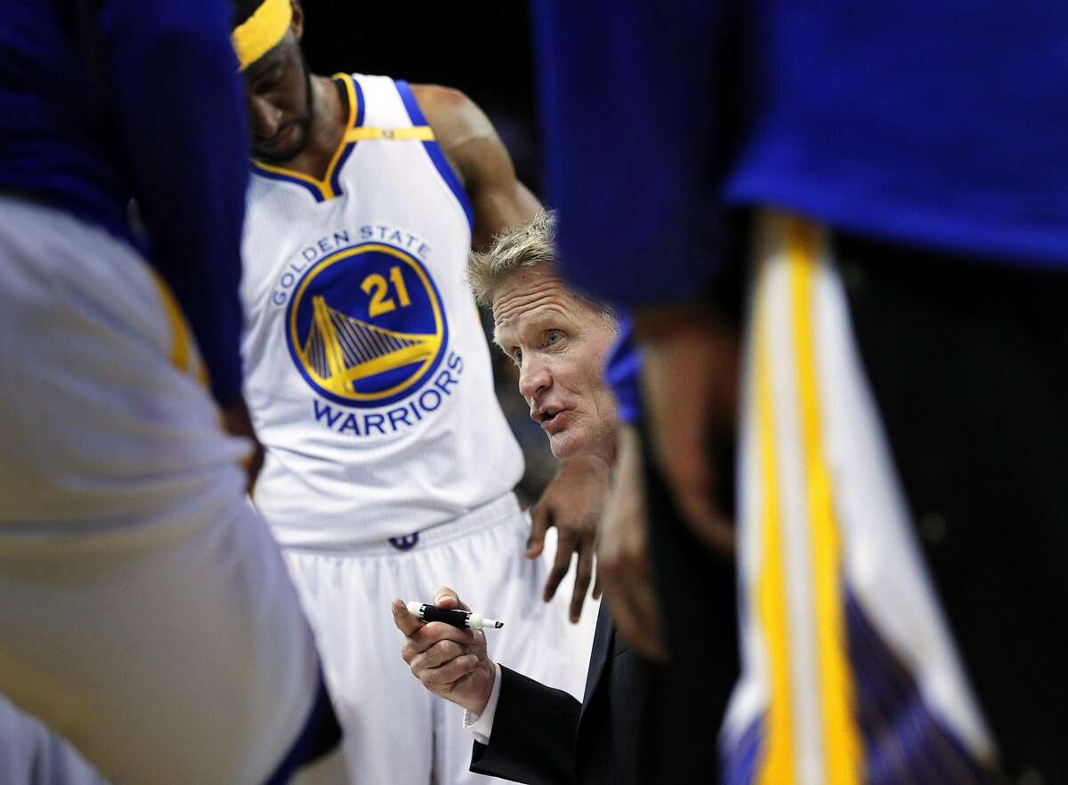 Head coach Steve Kerr draws out a play for his players during a timeout in the the fourth quarter as the Golden State Warriors played the Minnesota Timberwolves at Oracle Arena in Oakland, Calif., on Tuesday, April 4, 2017.