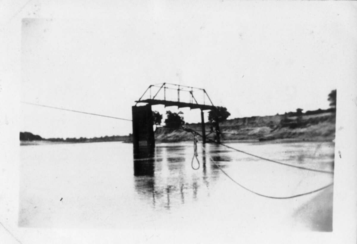 The Brazos River bridge in Rosenberg, shown after being damaged in a flood in 1922