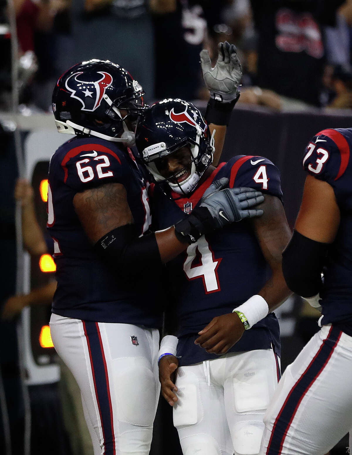 Houston Texans quarterback Deshaun Watson (4) hugs offensive guard Chad Slade (62) after Watson jumped into the end zone for a touchdown during the third quarter of an NFL preseason game at NRG Stadium, Saturday, Aug. 19, 2017, in Houston. ( Karen Warren / Houston Chronicle )