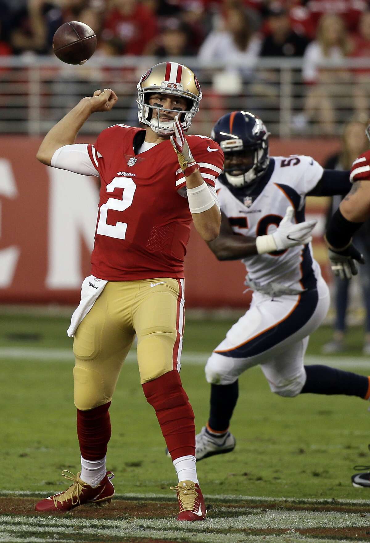 San Francisco 49ers quarterback Brian Hoyer (2) looses his grip on the ball and fumbles while trying to pass during the first half of a preseason NFL football game against the Denver Broncos Saturday, Aug. 19, 2017, in Santa Clara, Calif. (AP Photo/Eric Risberg)