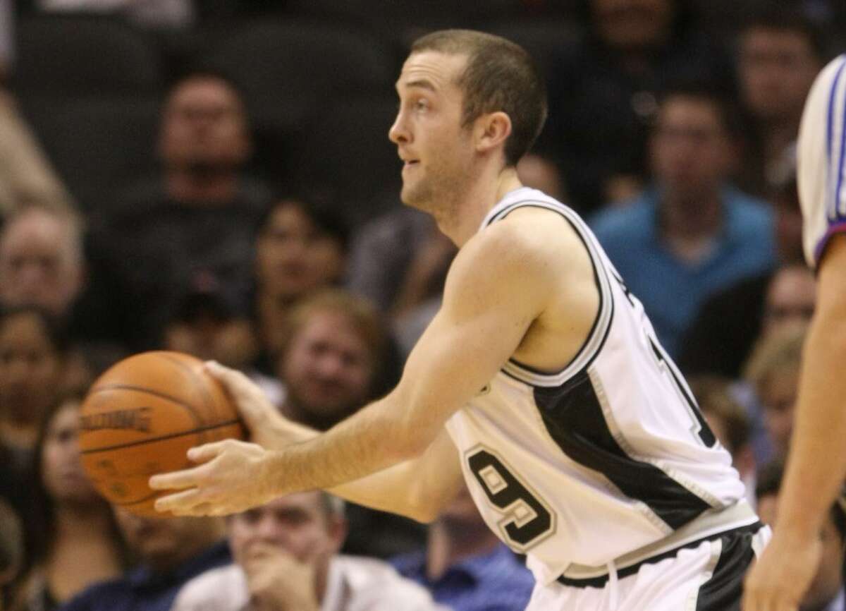 Spurs guard Blake Ahearn looks to pass in 2008 against Denver at the AT&T Center.