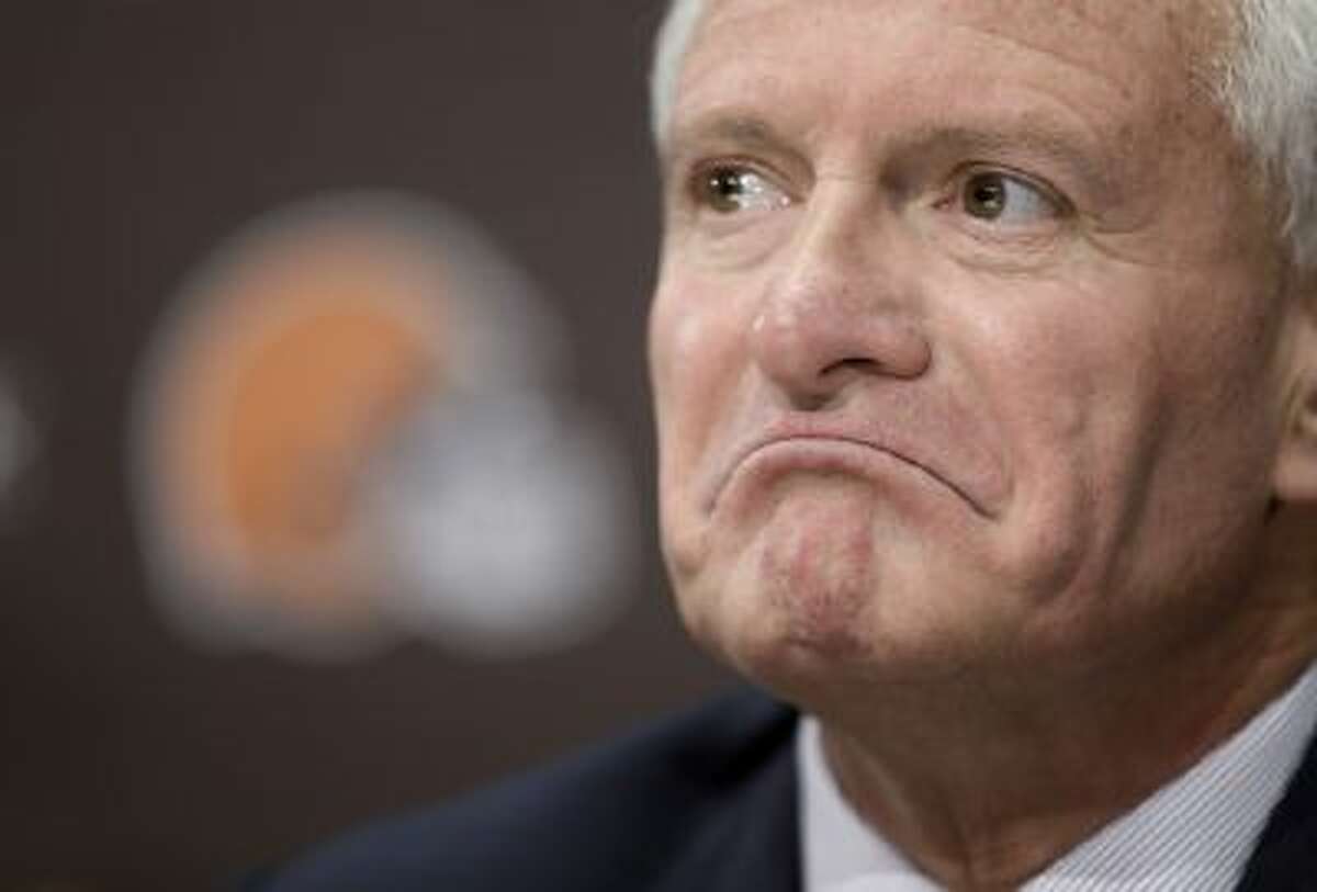 Cleveland Browns owner Jimmy Haslam listens to a question during a news conference Tuesday in Berea, Ohio. Haslam announced Tuesday that CEO Joe Banner will step down in the next two months and general manager Michael Lombardi is leaving the team.