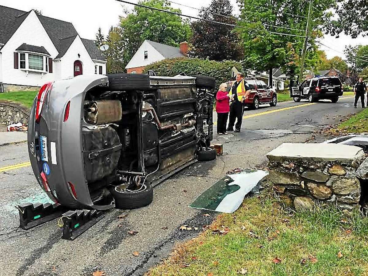 Woman rescued as rollover crash briefly closes road in Torrington