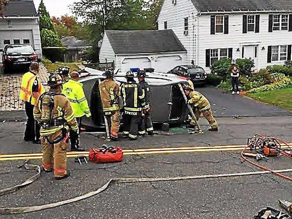 Woman rescued as rollover crash briefly closes road in Torrington