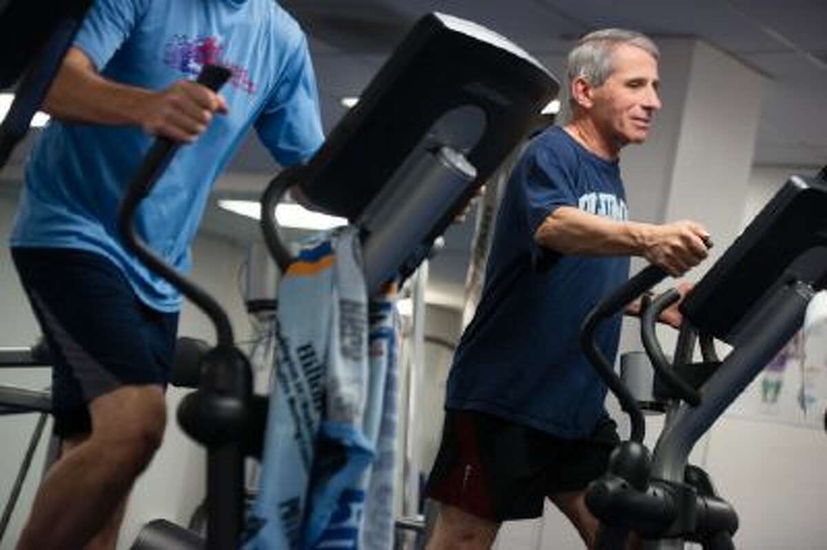 Dr. Anthony Fauci, 72, director of the National Institute of Allergy and Infectious Diseases, exercises Oct. 31, 2013 in the gym at the National Institutes of Health in Bethesda, Md.