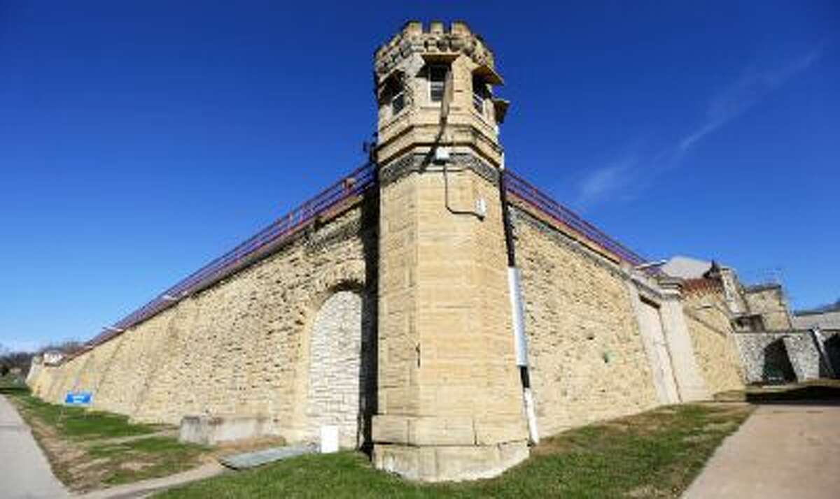 This Monday, Nov. 18, 2013, photo shows a guard tower at the Iowa State Penitentiary in Fort Madison, Iowa.