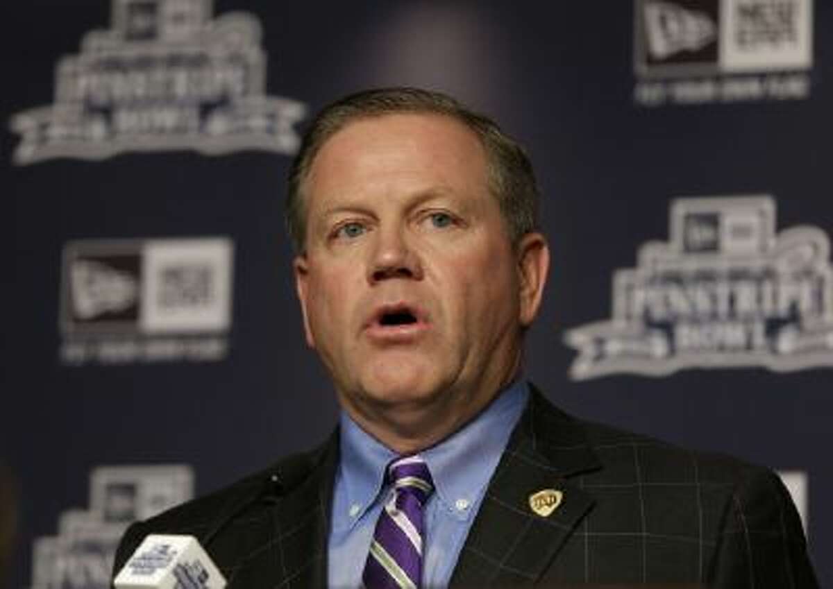 Notre Dame coach Brian Kelly speaks at a press conference for the Pinstripe Bowl, which will be played at Yankee Stadium Dec. 28.