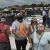 People watch the partial solar eclipse from the rooftop of the San Antonio College Scobee Observator y last August. SAC is one of five colleges in the Alamo Colleges District, whose board election May 5 features multiple challenges to four incumbents.