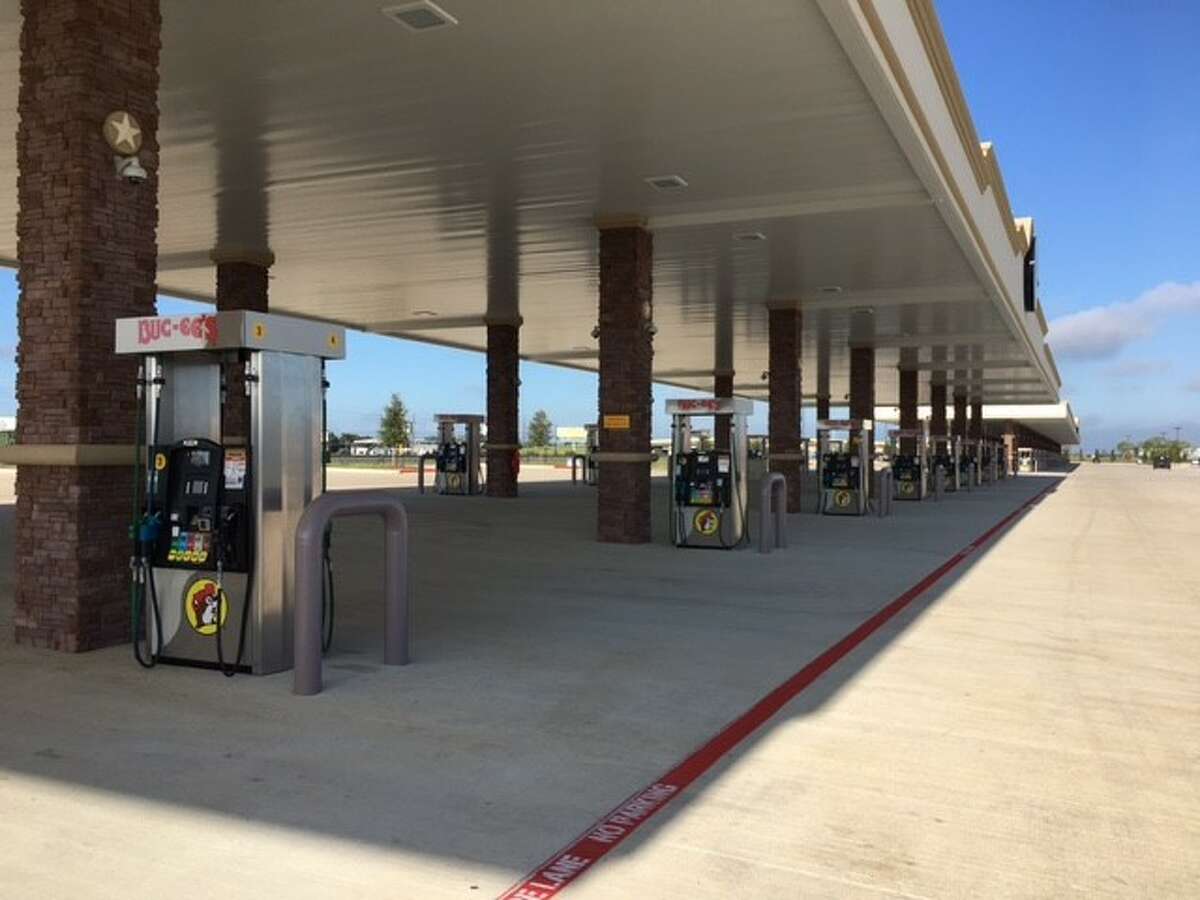 Gas pumps sit idle at the Buc-ee's in Katy, scheduled to open Aug. 28.