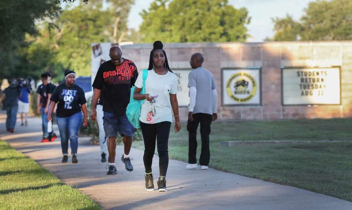 Students from the mold-infested Willow Ridge High School started their first day of school at rival Thurgood Marshalll High School Tuesday, Aug. 22, 2017, in Missouri City. Roughly 1,300 students started their academic year at their Marshall as clean up of Willow Ridge is still ongoing. ( Steve Gonzales / Houston Chronicle )