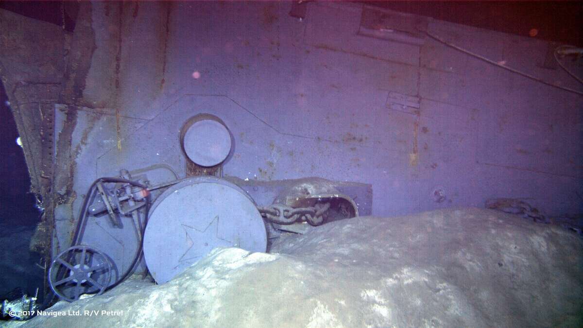 An image shot from a remotely operated vehicle shows wreckage which appears to be one of the two anchor windlass mechanisms from the forecastle of the ship. Note the star-emblazoned capstans in this photo dated July 12, 1945, just weeks before the ship was lost. 