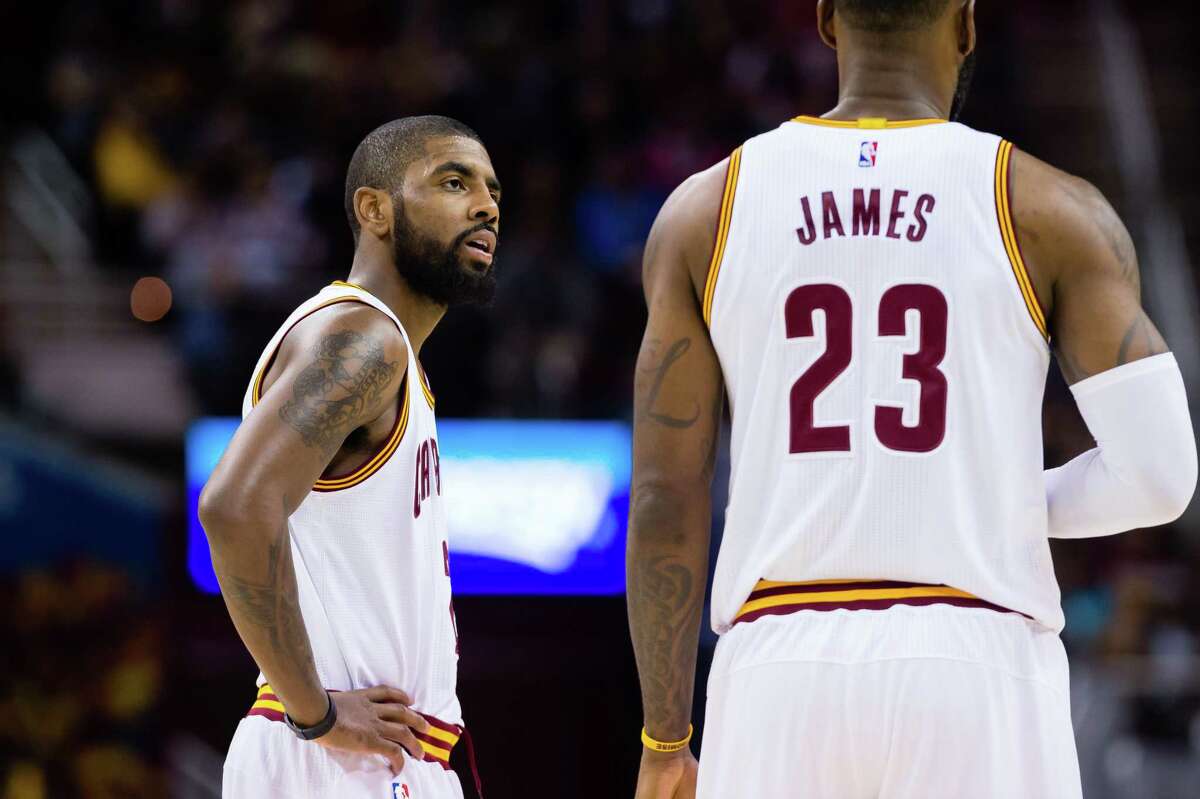 After teaming with LeBron James to win one NBA title, Kyrie Irving (left) will now be facing off against him in the East.