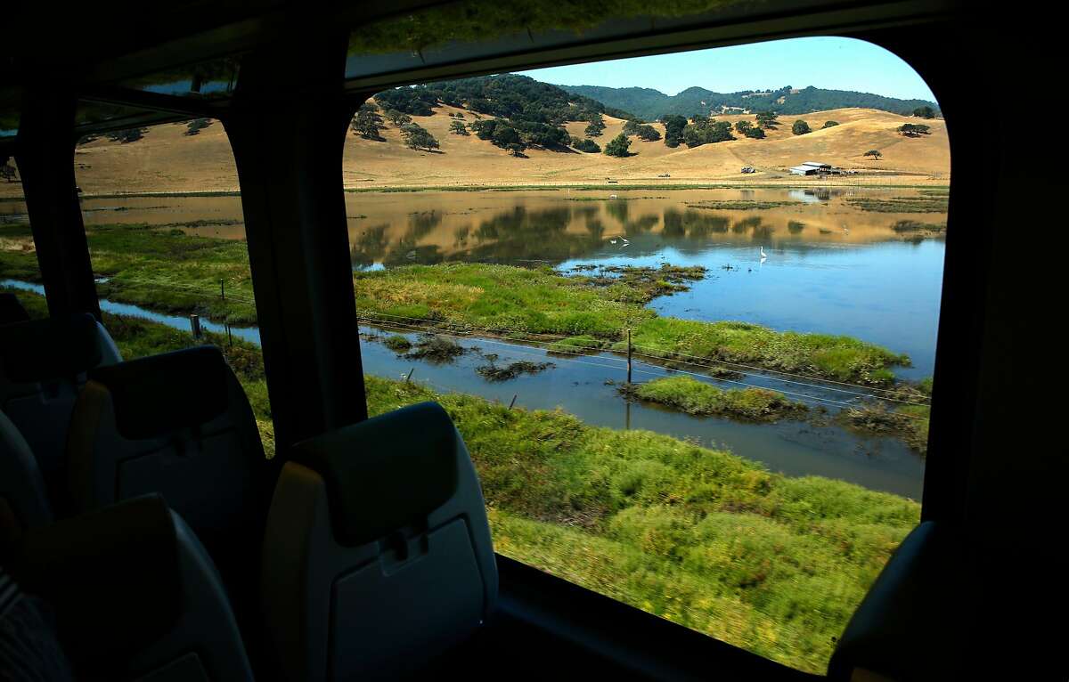 The views over the marshlands aboard the SMART train as it travels from the Petaluma train station en-route to the San Rafael station, during a demonstration run on Wednesday June 28, 2017 near Petaluma, Ca.