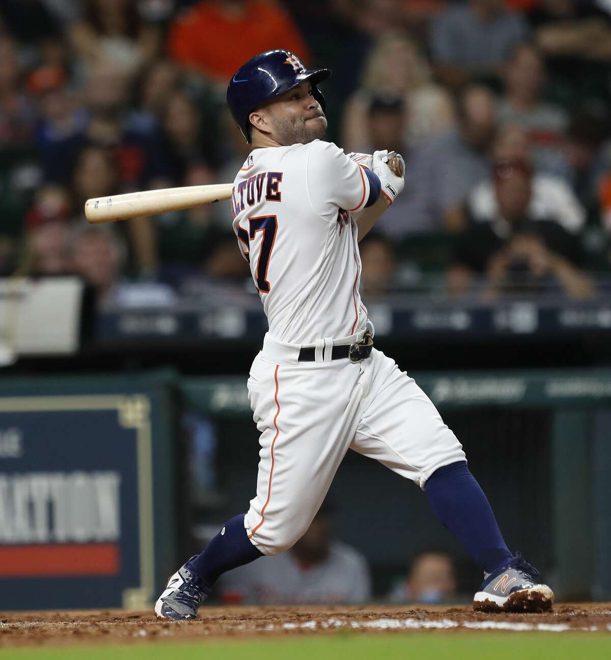 Houston Astros Jose Altuve (27) hits a triple in the fourth inning of an MLB baseball game at Minute Maid Park, Wednesday, Aug. 23, 2017, in Houston. ( Karen Warren / Houston Chronicle )