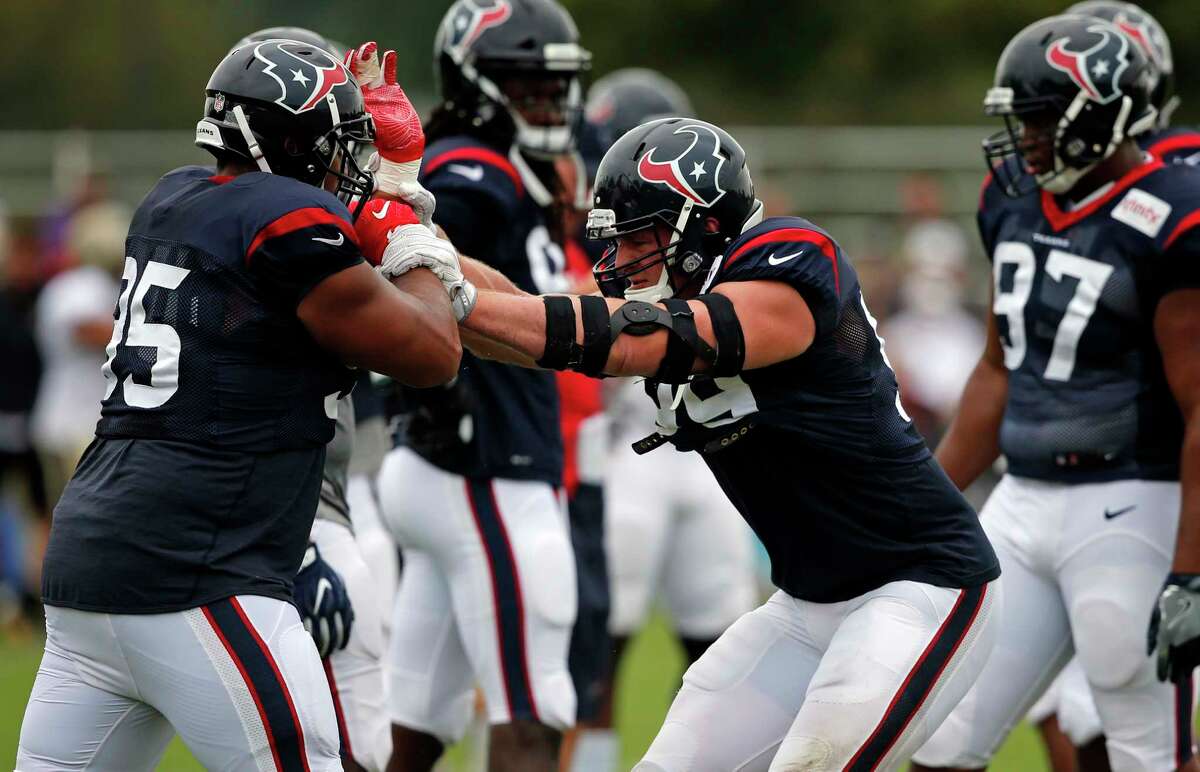 Houston Texans defensive end J.J. Watt right, goes through drills during a joint practice with the New Orleans Saints at the Saints NFL football training facility in Metairie, La., Thursday, Aug. 24, 2017. (AP Photo/Gerald Herbert)