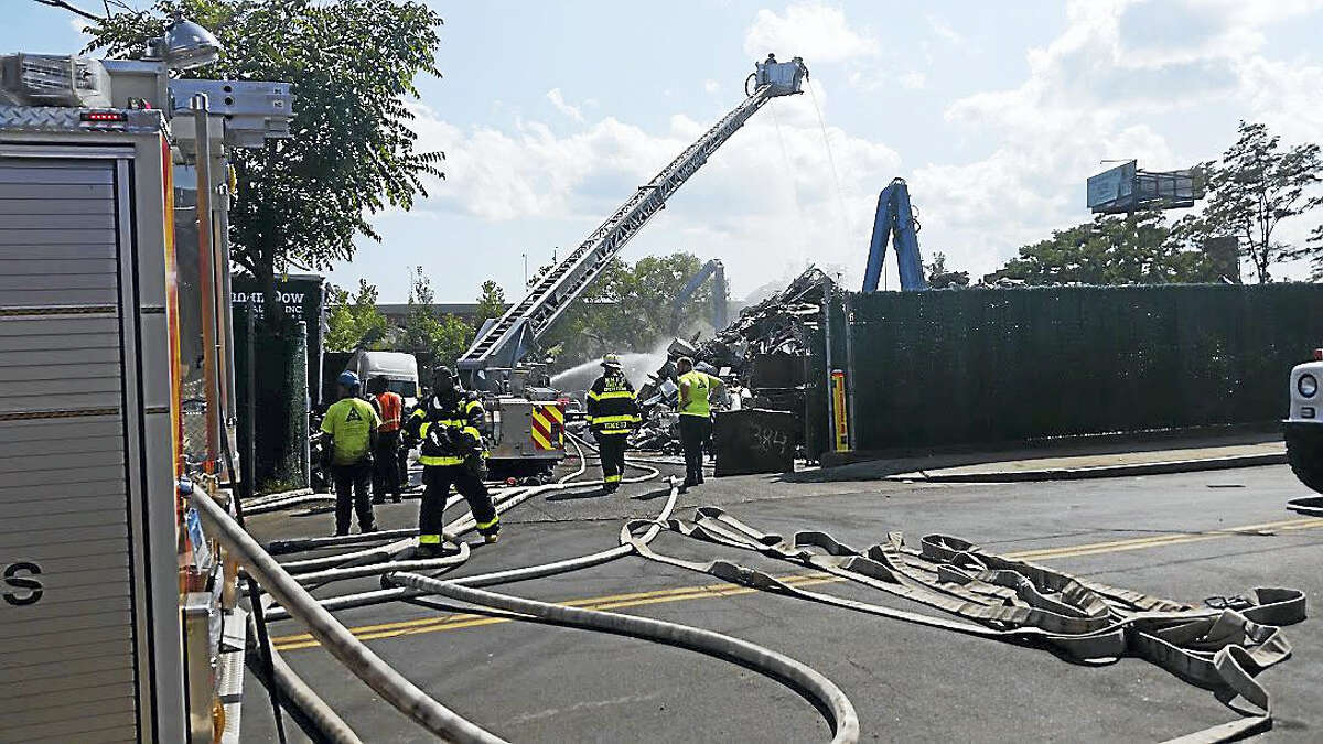 Crews responded to a scrap yard fire on Chapel Street in New Haven on Thursday afternoon.