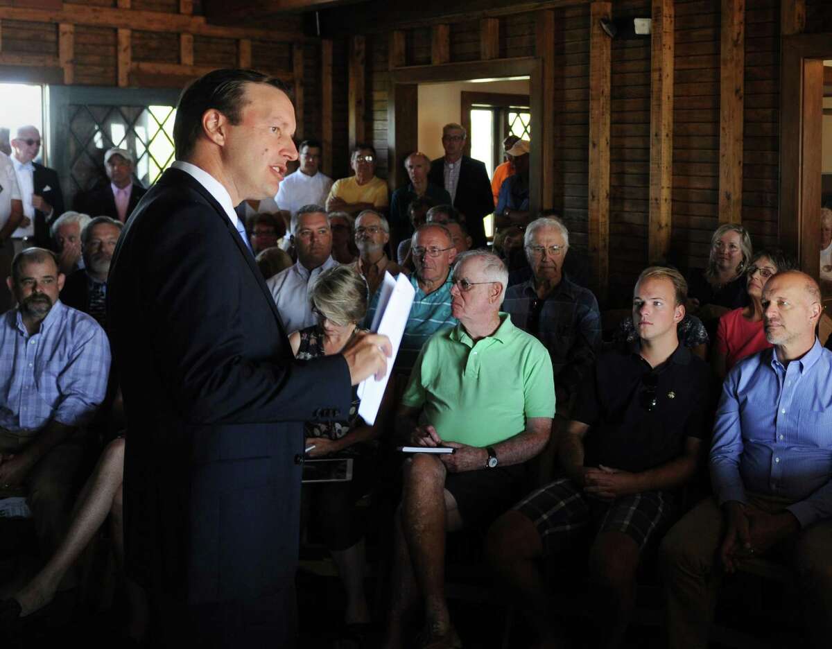 U.S. Sen. Chris Murphy speaks about the Long Island Sound at Greenwich Point Park's Innis Arden Cottage in Old Greenwich, Conn. Thursday, Aug. 24, 2017. Sen. Murphy addressed President Trump's proposed Envirnomental Protection Agency budget cuts, which would eliminate the EPA's Long Island Sound program.