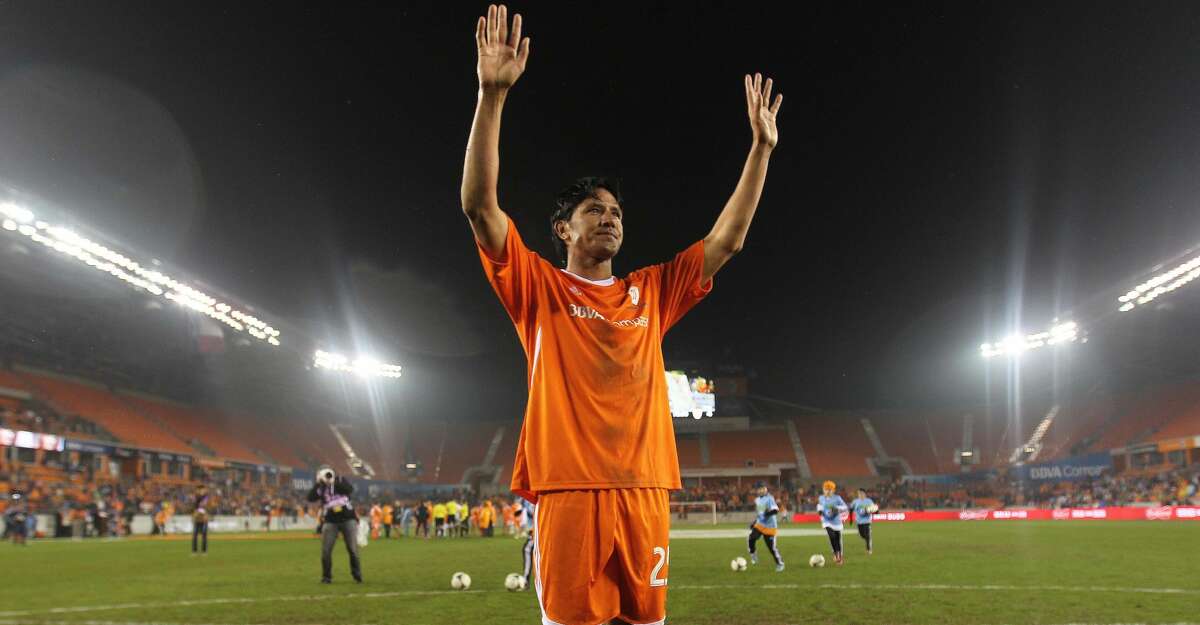 Houston Dynamo's Brian Ching acknowledges the crowd after the Brian Ching Testimonial Match, Friday, December 13, 2013, at BBVA Compass Stadium in Houston. Ching is launching a soccer bar in EaDo near the Dynamo stadium in March 2018.