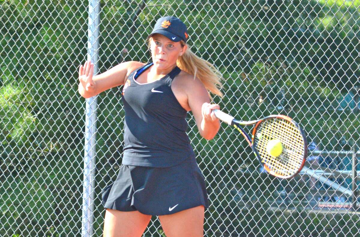 Edwardsville’s Mady Schreiber makes a forehand return during her No. 3 singles match on Thursday against St. Joseph’s Academy at the EHS Tennis Center.