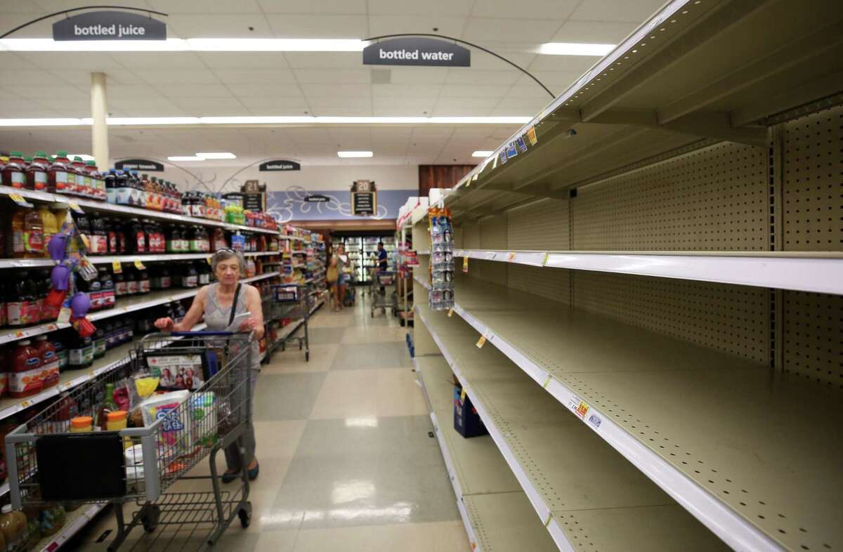 Consumers found empty shelves Thursday in the bottled water section at the Kroger on Buffalo Speedway. The store is expecting truckloads of water today before Harvey reaches landfall.
