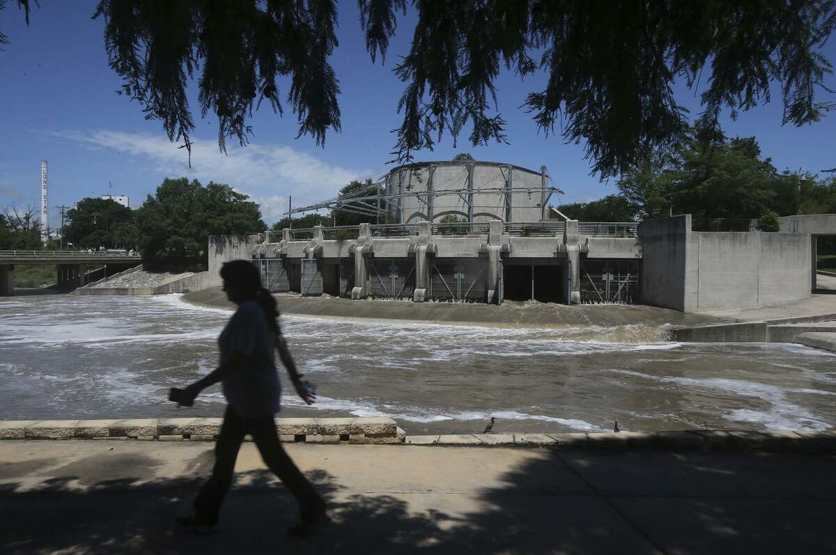 Water flows at the flood control tunnel outlet park at Lone Star Boulevard and Mission Road after heavy rain fell in the San Antonio area in 2016.