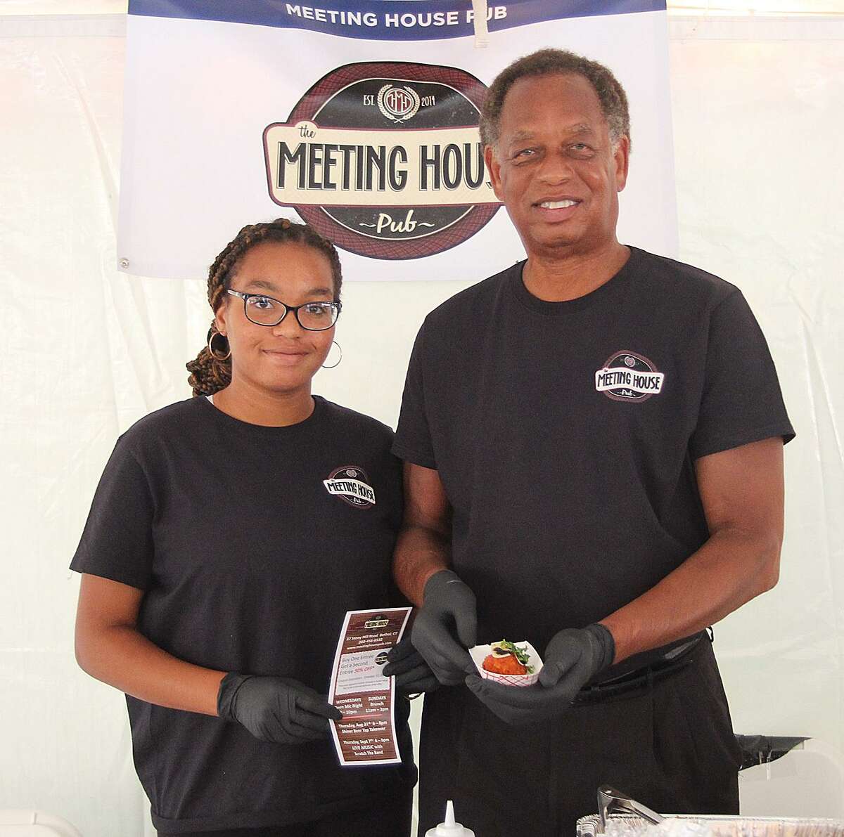 Martin and Miranda Smith of The Meeting House served lasagna balls at the Best of Bethel event held Wednesday, Aug. 23, 2017, at Bennett Memorial Park in Bethel, Conn.