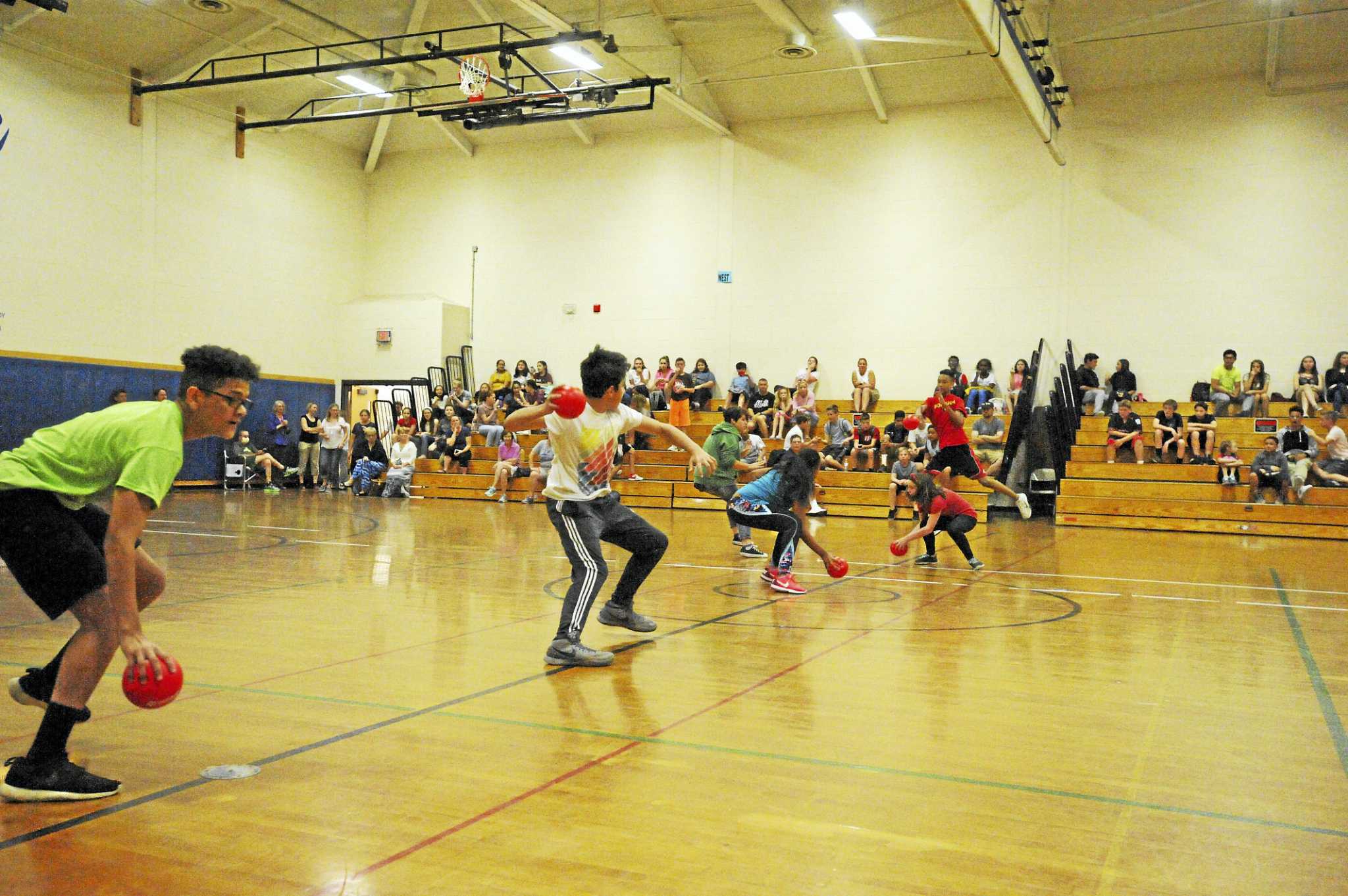 Torrington Middle School plays dodgeball, good sport in the face of pie, to raise funds The