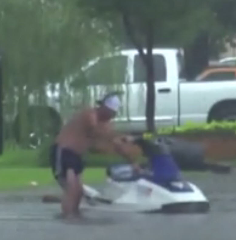 Video Man rides jet ski through flooded Oklahoma road