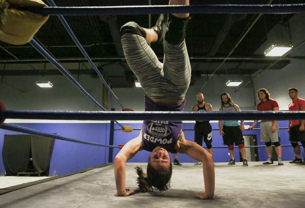 Kylie Rae, 24, works on her moves during a training drill at Reality of Wrestling Thursday, Aug. 17, 2017, in Texas City. ( Yi-Chin Lee / Houston Chronicle )