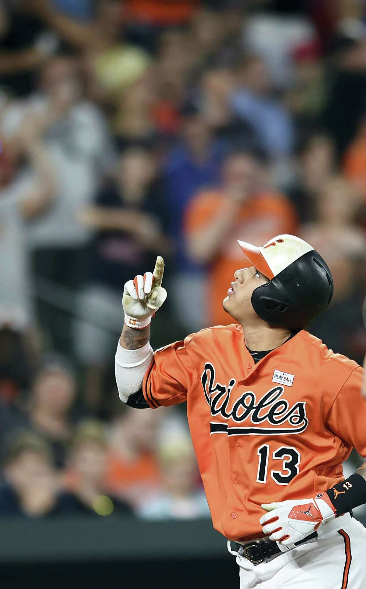 Baltimore Orioles’ Manny Machado reacts after hitting a solo home run against the Boston Red Sox in a baseball game on June 3, 2017 in Baltimore.