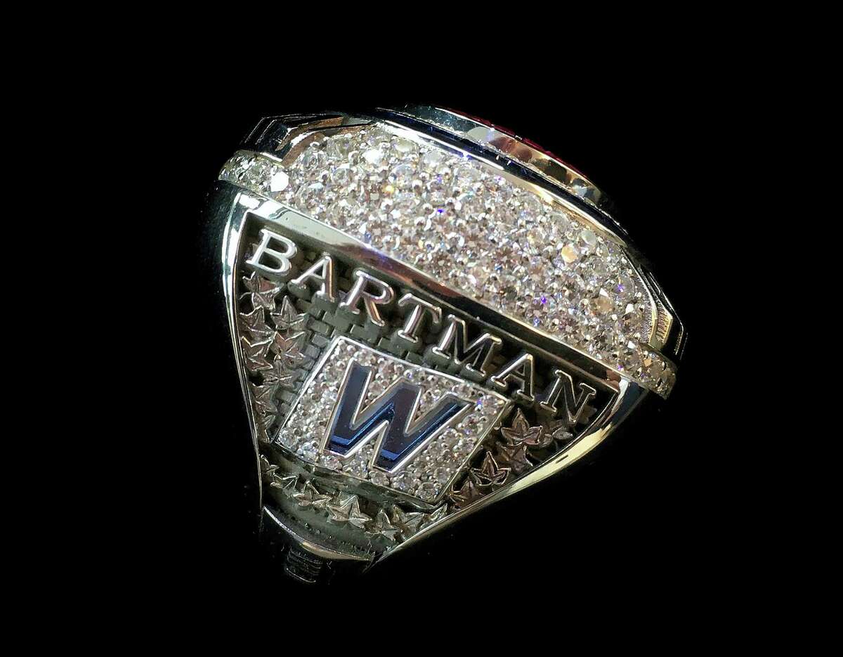 This photo provided by the Chicago Cubs shows a 2016 World Series championship ring the team was giving to Steve Bartman, the fan remembered for deflecting a foul ball that appeared destined to land in left fielder Moises Alou’s glove with Chicago five outs from the World Series in 2003.