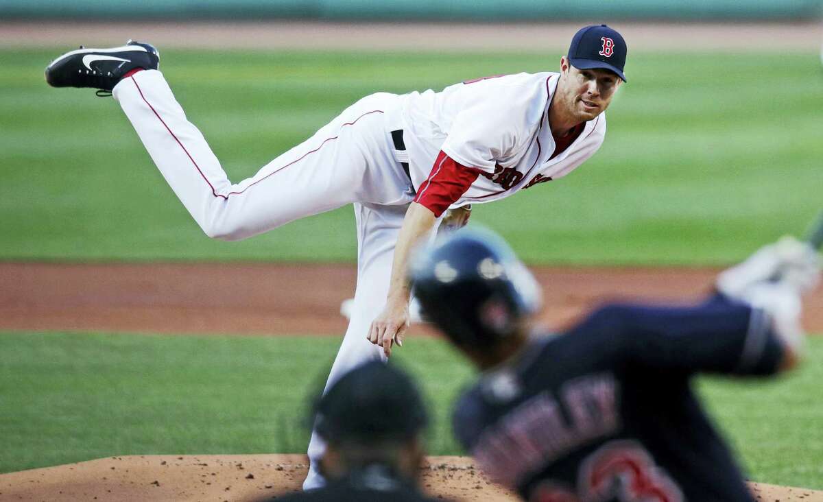 Red Sox starting pitcher Doug Fister delivers in the first inning on Monday.