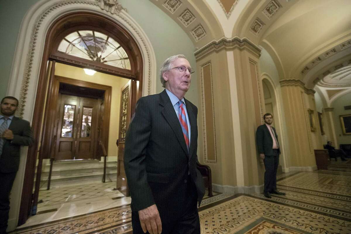 Senate Majority Leader Mitch McConnell of Ky. leaves the Senate chamber on Capitol Hill in Washington, Thursday after a vote as the Republican majority in Congress remains stymied by their inability to fulfill their political promise to repeal and replace “Obamacare” because of opposition and wavering within the GOP ranks.