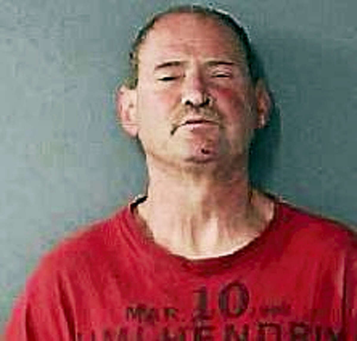 Robert Murphy, 56, was arrested Thursday after police say he attacked a woman and held her at knifepoint.