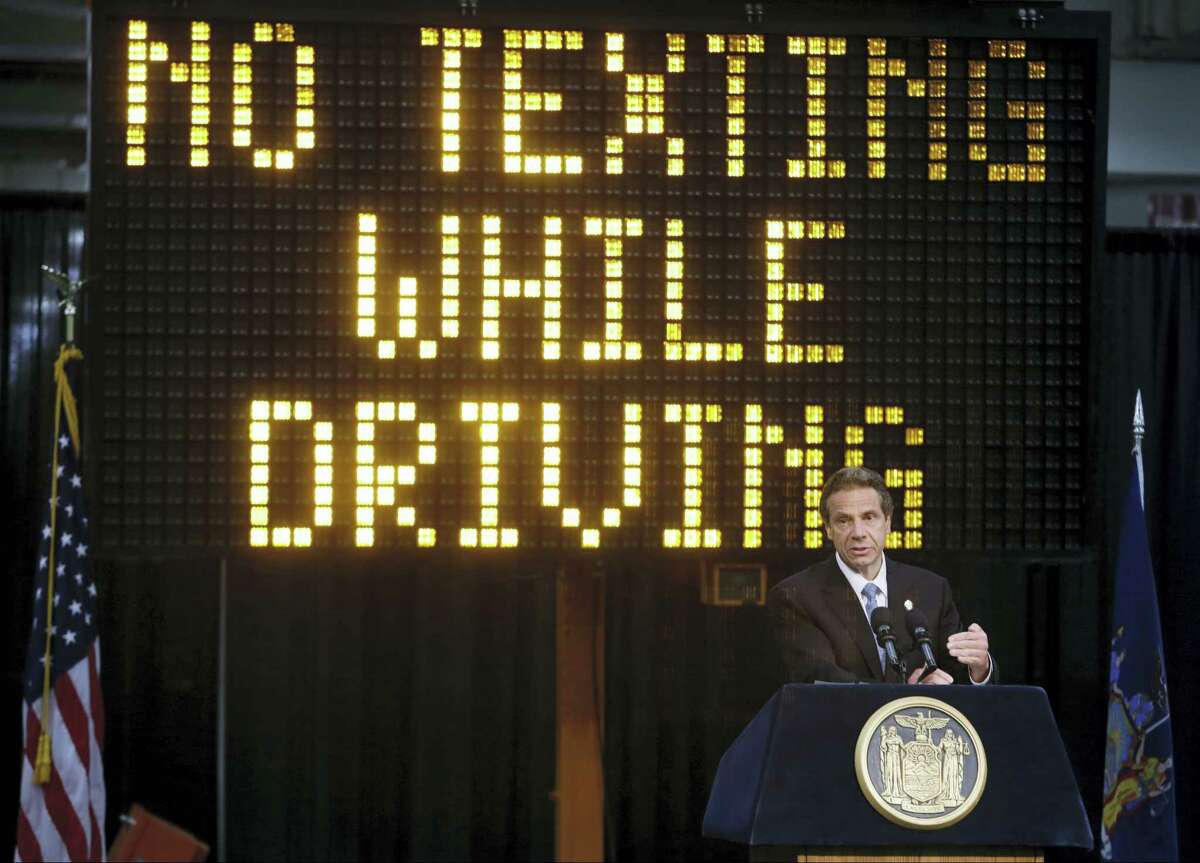 In this May 31, 2013, file photo, New York Gov. Andrew Cuomo speaks during a news conference to announce the increase in penalties for texting while driving in New York. New York state is set to study the use of a device known as the “textalyzer” that would allow police to determine whether a motorist involved in a serious crash was texting while driving. Cuomo announced Wednesday, July 26, 2017, that he would direct the Governor’s Traffic Safety Committee to examine the technology, as well as the privacy and constitutional questions it could raise.