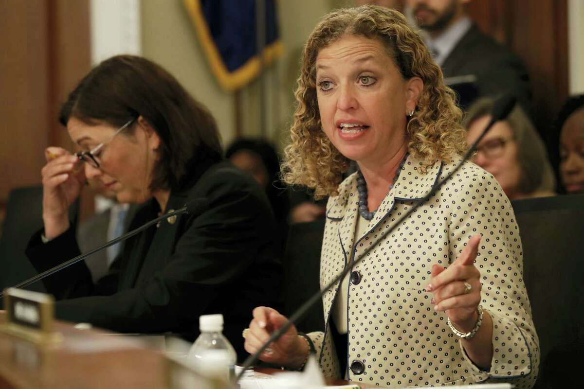 In this May 24, 2017, file photo, House Budget Committee member Rep. Debbie Wasserman Schultz, D-Fla. questions Budget Director Mick Mulvaney on Capitol Hill in Washington during the committee’s hearing on President Donald Trump’s fiscal 2018 federal budget. Fellow committee member Rep. Susan DelBene, D-Wash. is at left. Wasserman Schultz fired IT staffer Irman Awan on July 25, 2017, following his arrest on a federal bank fraud charge. (AP Photo/Jacquelyn Martin, File)