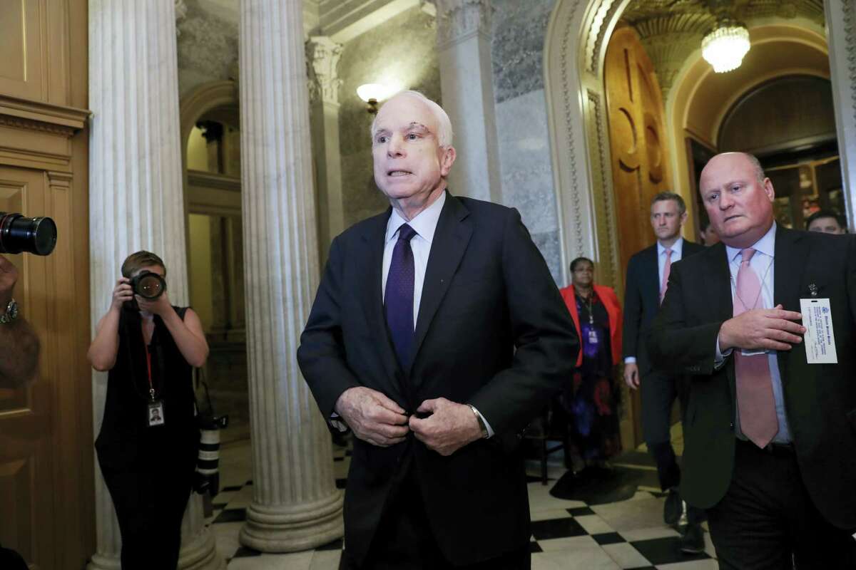Sen. John McCain, R-Ariz., who returned to Capitol Hill after being diagnosed with an aggressive type of brain cancer, leaves the chamber after vote the Republican-run Senate rejected a GOP proposal to scuttle President Barack Obama’s health care law, Wednesday, July 26, 2017, in Washington. President Donald Trump and Senate Majority Leader Mitch McConnell, R-Ky., have been stymied by opposition from within the Republican ranks.