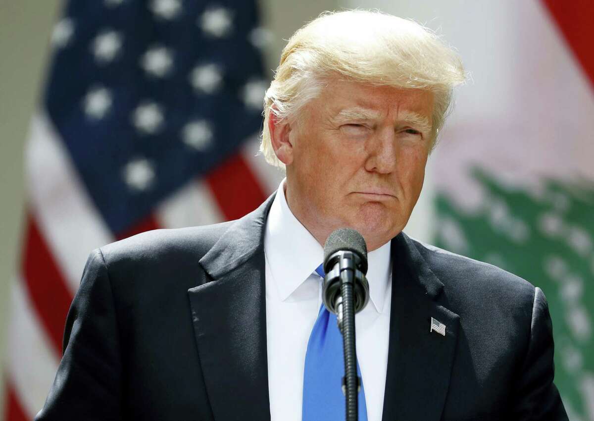 President Donald Trump listens to a question during a joint news conference with Lebanese Prime Minister Saad Hariri in the Rose Garden of the White House in Washington, Tuesday, July 25, 2017.