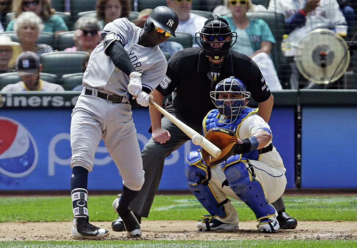 Didi Gregorius hits a solo home run in the fourth inning on Sunday.