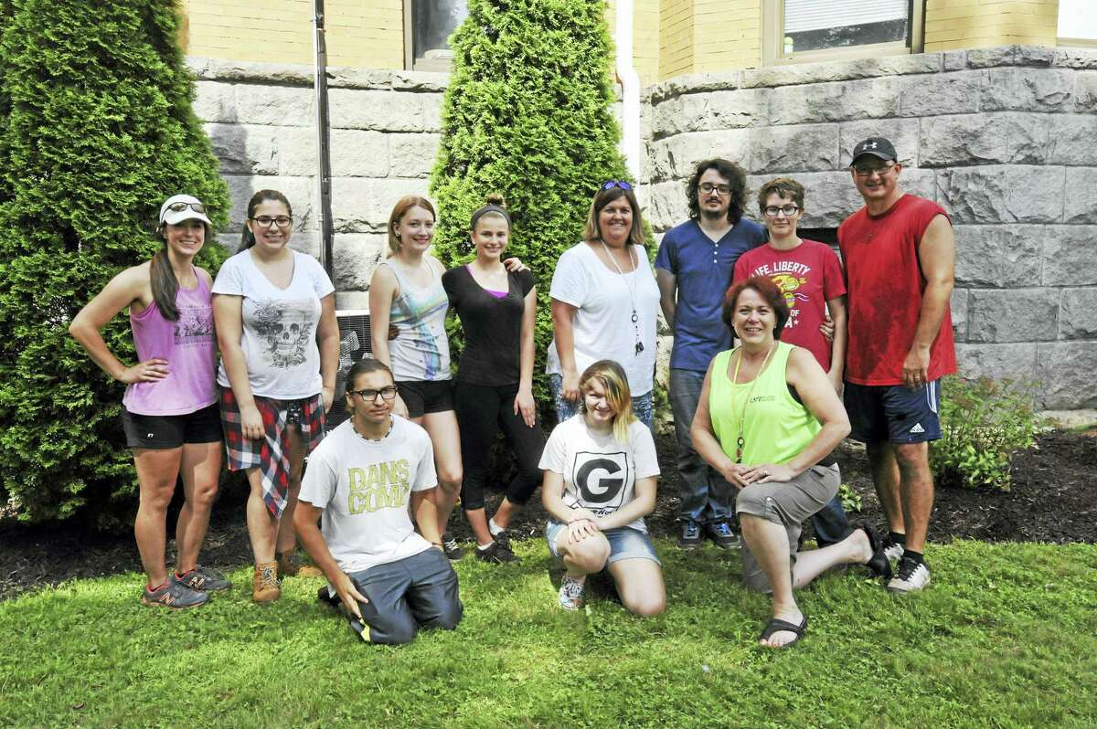 Explorations Charter School students have worked this week to beautify the school grounds in Winsted. Pictured above: Shannon Whitney, Mike Sanzaro, Cassie Ibitz, Melissa Zucca, Ash Nejaime, Molly Gallagher, Madisen Clapps, Sarah Buick, Kyle Peterson, and Colleen Renzullo.