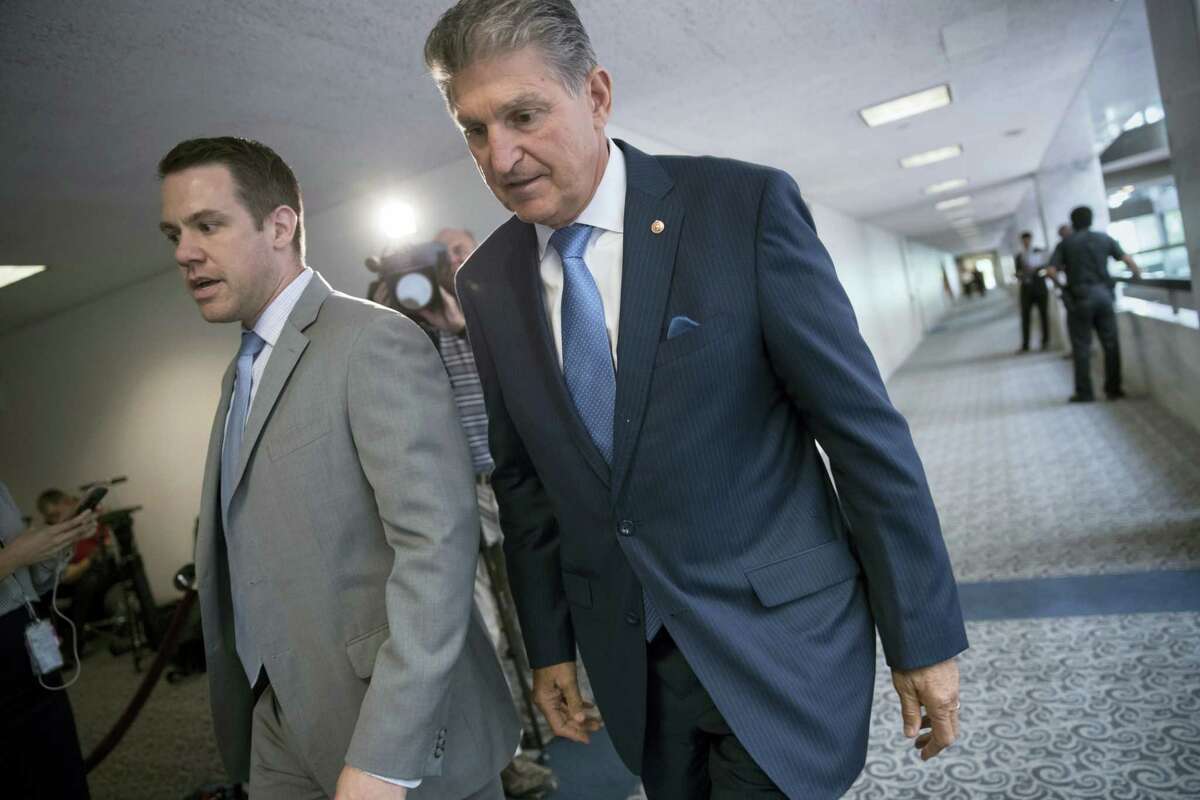 Sen. Joe Manchin, D-W.Va., center, a member of the Senate Intelligence Committee, leaves after a closed-door meeting of that panel on Capitol Hill in Washington, Thursday, July 20, 2017. The Senate intelligence committee has scheduled perhaps the most high-profile testimony involving the Russian meddling probes since former FBI Director James Comey appeared in June. A lawyer for Trump’s powerful son-in-law and adviser says Jared Kushner will speak to the Senate intelligence committee Monday. Donald Trump Jr. is scheduled to appear before the Senate Judiciary Committee next Wednesday along with former campaign chairman Paul Manafort.