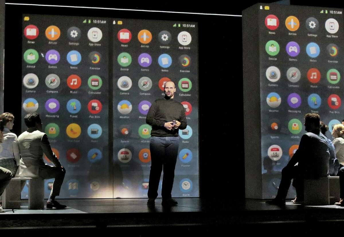 This image released by the Santa Fe Opera shows Edward Parks as Steve Jobs in Santa Fe Opera’s world premiere of Mason Bates and Mark Campbell’s opera, “The (R)evolution of Steve Jobs,” in Santa Fe, N.M.