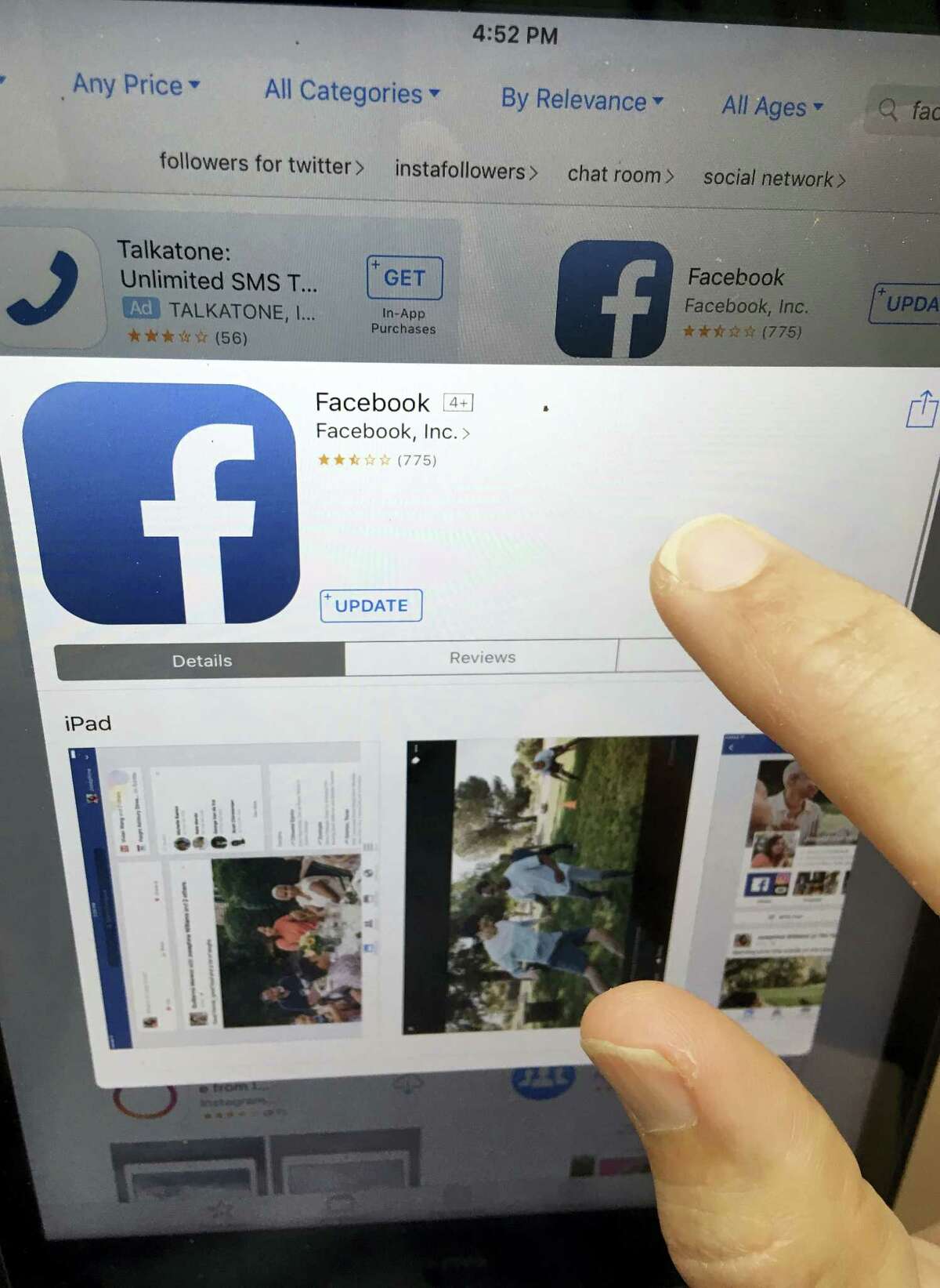 This Monday, June 19, 2017, photo shows Facebook launched on an iPhone, in North Andover, Mass. Facebook is working on a way for news organizations to charge readers for articles they share and read on the social network. Facebook‚Äôs head of news partnerships, Campbell Brown, says the current plan is to require payments after reading 10 articles from a publisher through Facebook. Brown said at a conference in New York on Tuesday, July 18, 2017, that news organizations have been calling for subscription capabilities.