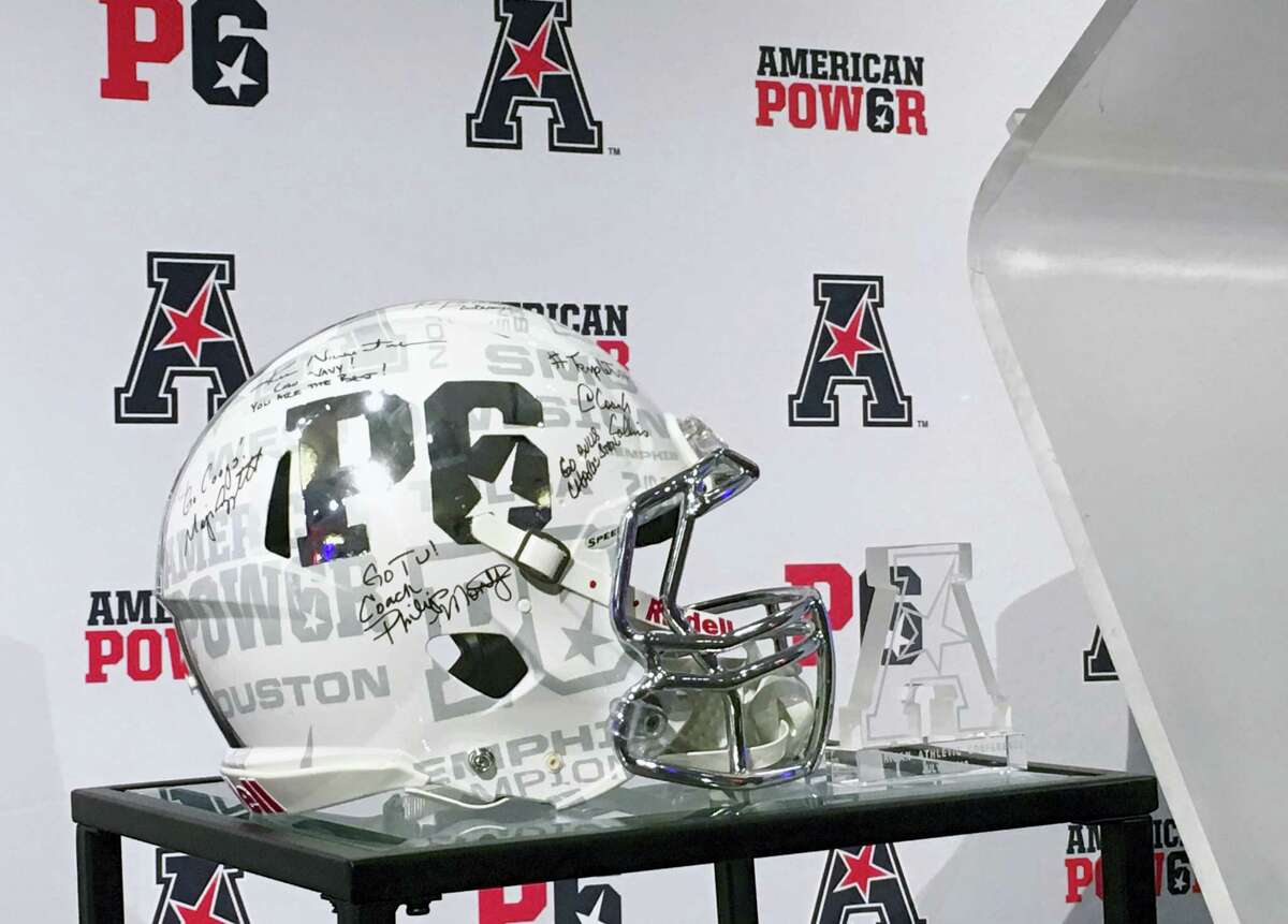 The P6 football helmet is displayed at American Athletic Conference media day in Newport, R.I., Tuesday. The conference is trying to brand itself as a peer to the most powerful leagues in college football in the hopes for creating a Power Six.